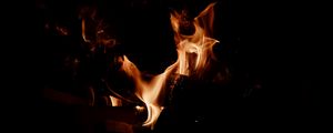 Preview wallpaper bonfire, fire, flame, dark, sparks