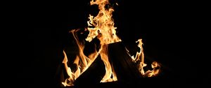 Preview wallpaper bonfire, fire, flame, black, dark