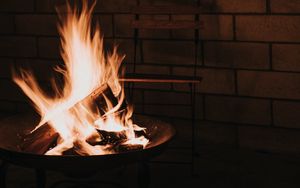 Preview wallpaper bonfire, fire, flame, wood, chair