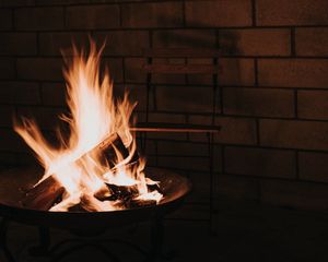 Preview wallpaper bonfire, fire, flame, wood, chair