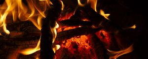 Preview wallpaper bonfire, fire, flame, wood, coals, dark