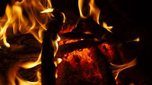 Preview wallpaper bonfire, fire, flame, wood, coals, dark