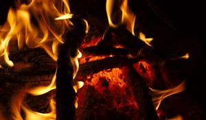 Preview wallpaper bonfire, fire, flame, wood, coals, dark