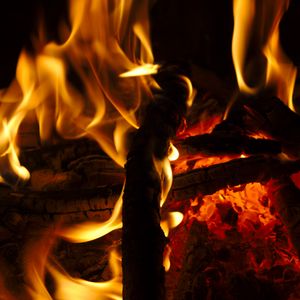 Preview wallpaper bonfire, fire, flame, wood, coals, dark