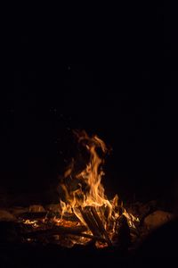 Preview wallpaper bonfire, fire, flame, branches, dark