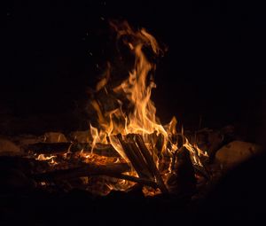 Preview wallpaper bonfire, fire, flame, branches, dark