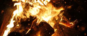 Preview wallpaper bonfire, fire, flames, coals, firewood, sparks