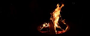 Preview wallpaper bonfire, fire, logs, black