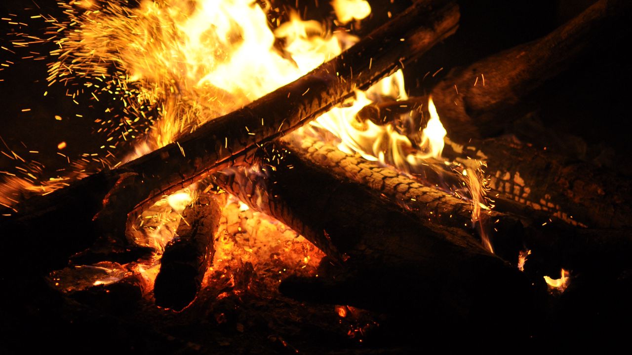 Wallpaper bonfire, fire, logs, sparks, darkness