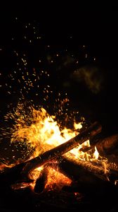 Preview wallpaper bonfire, fire, logs, sparks, darkness