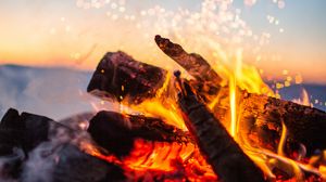 Preview wallpaper bonfire, fire, sparks, firewood, blur, camping