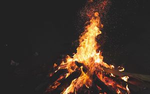Preview wallpaper bonfire, fire, sparks, night, dark