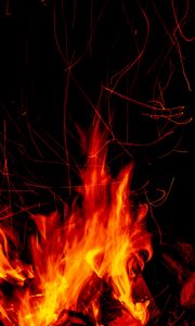 Preview wallpaper bonfire, fire, sparks, flame, dark