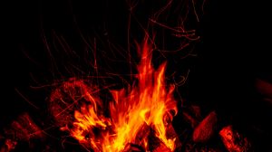 Preview wallpaper bonfire, fire, sparks, flame, dark