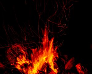 Preview wallpaper bonfire, fire, sparks, flame, dark