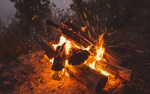 Preview wallpaper bonfire, fire, sparks, firewood