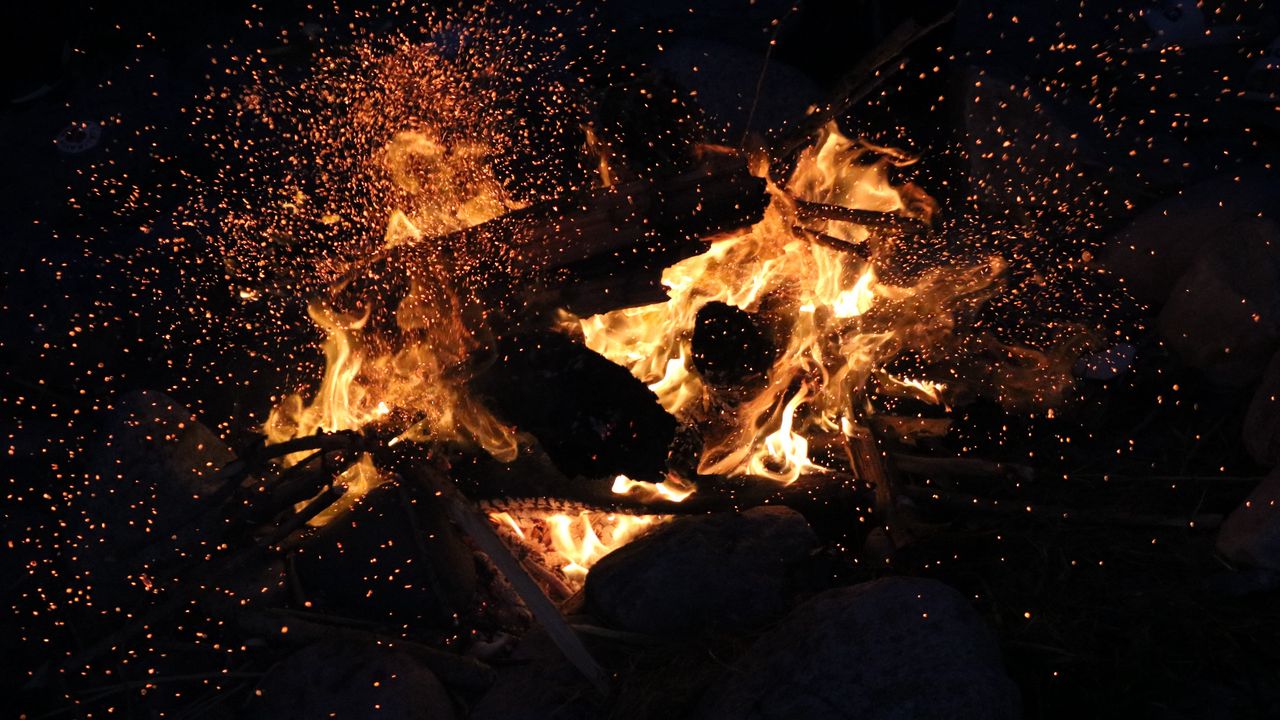 Wallpaper bonfire, fire, sparks, dark, flame