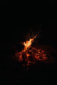 Preview wallpaper bonfire, fire, sparks, dark, night