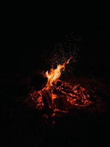 Preview wallpaper bonfire, fire, sparks, dark, night