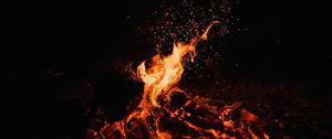 Preview wallpaper bonfire, fire, sparks, dark, night