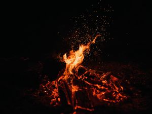 Preview wallpaper bonfire, fire, sparks, dark, night