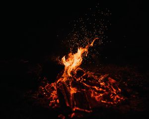 Preview wallpaper bonfire, fire, sparks, dark, night