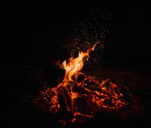 Preview wallpaper bonfire, fire, sparks, dark, night