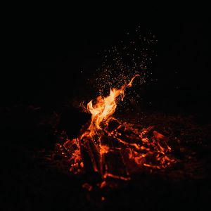 Preview wallpaper bonfire, fire, sparks, dark, night