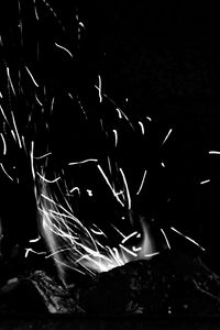 Preview wallpaper bonfire, fire, sparks, light, black and white, black