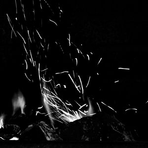 Preview wallpaper bonfire, fire, sparks, light, black and white, black