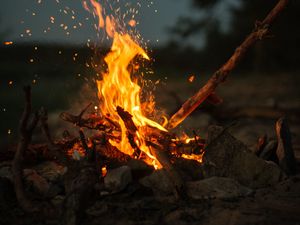 Preview wallpaper bonfire, fire, sticks, stones, camping