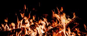 Preview wallpaper bonfire, flame, fire, sparks, black