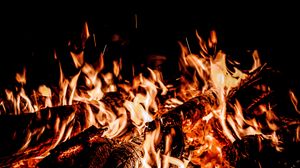 Preview wallpaper bonfire, flame, fire, sparks, black