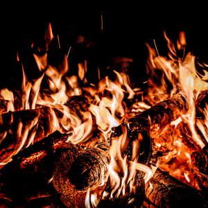 Preview wallpaper bonfire, flame, fire, sparks, black