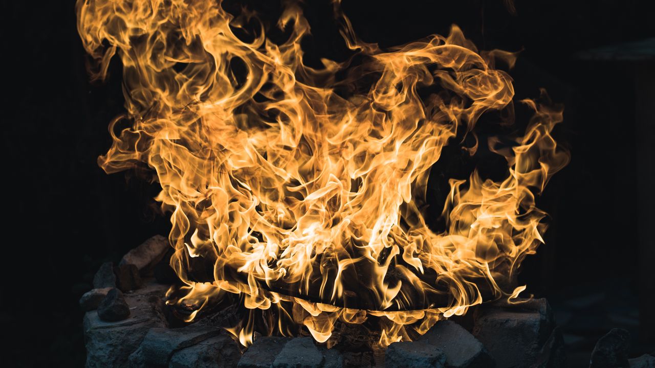 Wallpaper bonfire, flame, fire, stones, dark