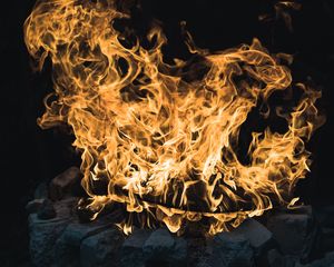 Preview wallpaper bonfire, flame, fire, stones, dark