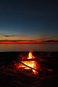 Preview wallpaper bonfire, flame, firewood, sunset, horizon