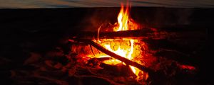 Preview wallpaper bonfire, flame, firewood, sunset, horizon