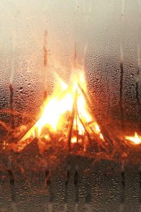 Preview wallpaper bonfire, flame, glass, drops, water