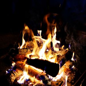 Preview wallpaper bonfire, flame, logs, coals, black