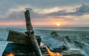 Preview wallpaper bonfire, flame, logs, coals, sunset