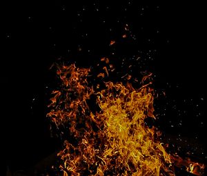 Preview wallpaper bonfire, flame, sparks, dark