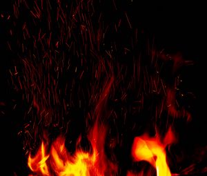 Preview wallpaper bonfire, flame, sparks, fire, black