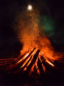 Preview wallpaper bonfire, flame, sparks, logs, night, dark