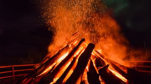 Preview wallpaper bonfire, flame, sparks, logs, night, dark