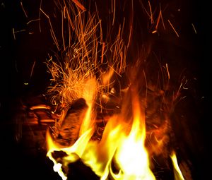 Preview wallpaper bonfire, flame, sparks, darkness