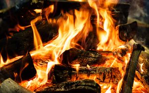 Preview wallpaper bonfire, logs, fire, flame, twilight, dark