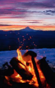 Preview wallpaper bonfire, nature, mountains, dusk, landscape