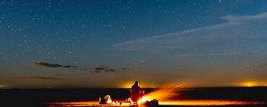 Preview wallpaper bonfire, silhouette, camping, starry sky, night