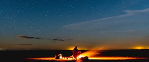 Preview wallpaper bonfire, silhouette, camping, starry sky, night